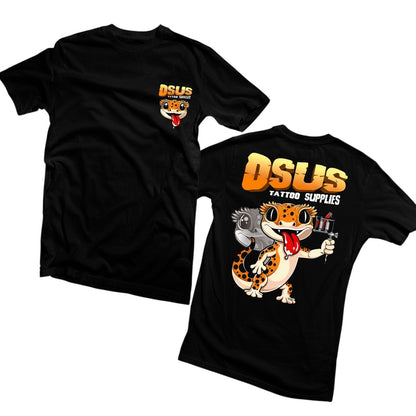 Osus Tattoo Supplies black t-shirt with a crested gecko design on the back holding a tattoo gun.
