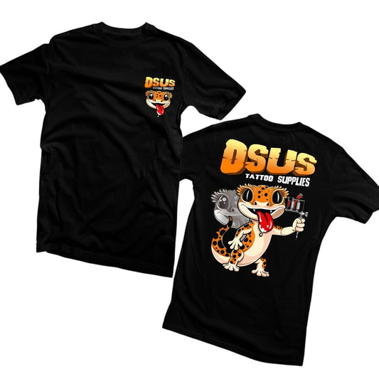 Osus Tattoo Supplies black t-shirt with a crested gecko design on the back holding a tattoo gun.